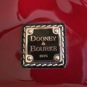 Gorgeous Patent burgandy dooney clutch vintage